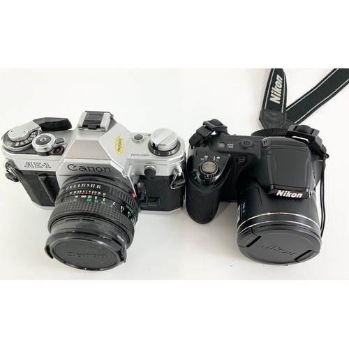 387 - CAMERAS AND ACCESSORIES INC. CANON AE-1 SLR WITH LENSES, NIKON COOLPIX L320 AND VARIOUS TRIPODS AND ... 