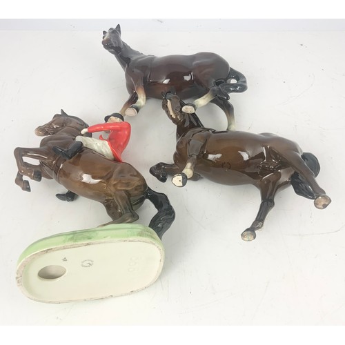 166 - BESWICK MODEL OF HUNTSMAN ON REARING HORSE  868, A BESWICK HORSE MODEL AND ANOTHER HORSE MODEL NO BA... 