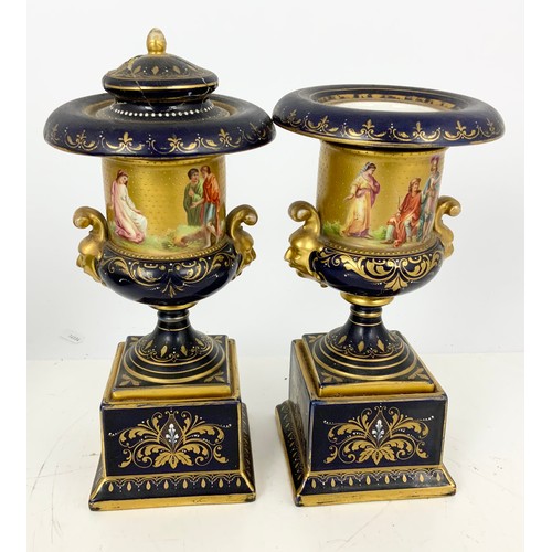 172 - PAIR OF CONTINENTAL PORCELAIN PEDESTAL URNS AF