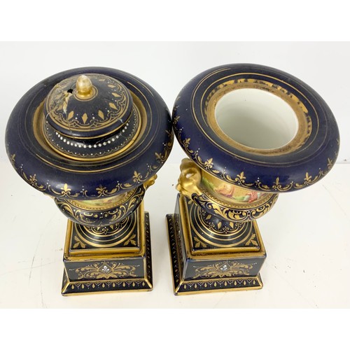 172 - PAIR OF CONTINENTAL PORCELAIN PEDESTAL URNS AF