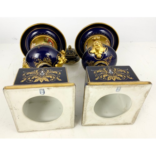 172 - PAIR OF CONTINENTAL PORCELAIN PEDESTAL URNS AF