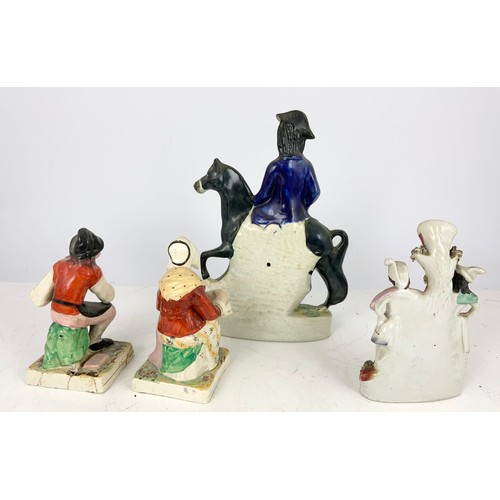 135 - STAFFORDSHIRE FIGURE OF DICK TURPIN  31cm TALL TOGETHER WITH A STAFFORDSHIRE SPILL HOLDER AND A PAIR... 