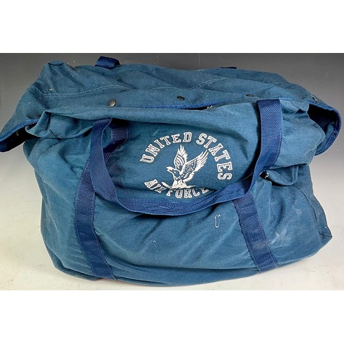 469 - UNITED STATES AIR FORCE CANVAS HOLDALL, SOUTH DAKOTA LEATHER BELT WITH CAST BUCKLE DEPICTING WELLS F... 