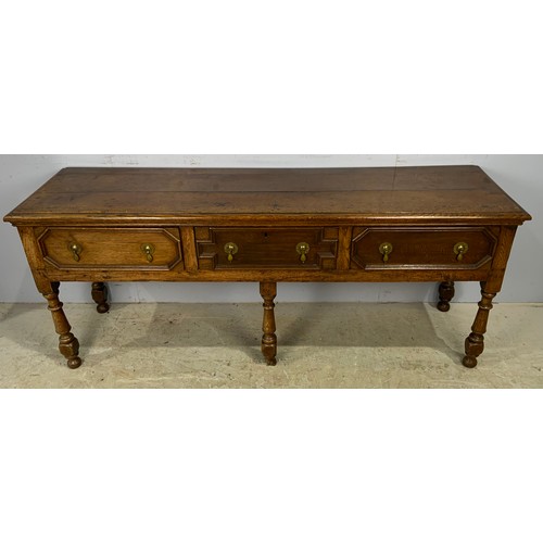 684 - OAK THREE DRAWER DRESSER BASE WITH GEOMETRIC MOULDINGS & DROP HANDLES WIDTH  180cm