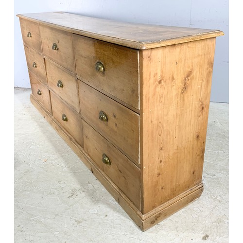 680 - PINE BANK OF 9 LARGE DRAWERS WIDTH 200cm EACH DRAWER APPROXIMATELY 62cm x 40cm x 24cm