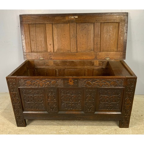 617 - CARVED OAK COFFER HIGHLY CARVED,  4 PANELS TO TOP AND 3 TO BASE