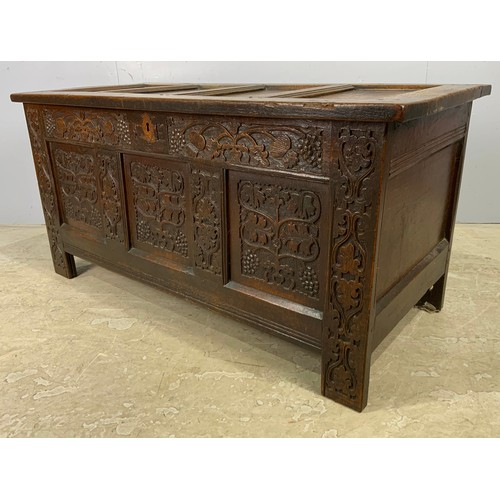 617 - CARVED OAK COFFER HIGHLY CARVED,  4 PANELS TO TOP AND 3 TO BASE