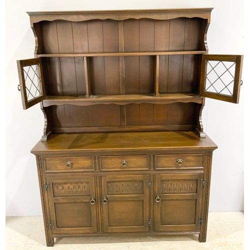 636 - OAK DRESSER WITH WOLFE’S OF BIRKENHEAD LABEL WIDTH 137cm. 183cm TALL