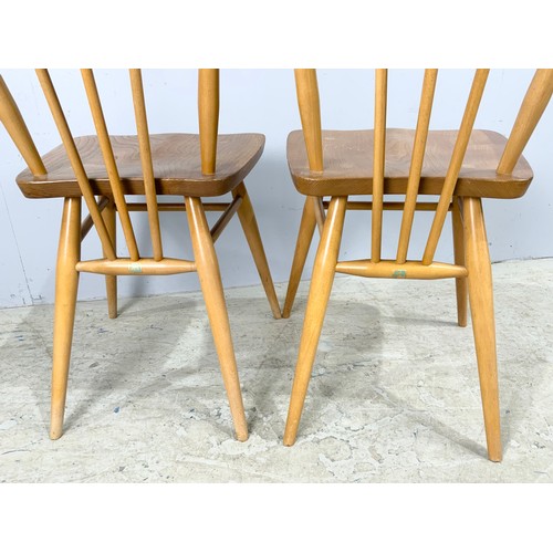 722 - A PAIR OF ERCOL MID CENTURY BLONDE ELM AND BEECH DINING CHAIRS, MODEL 391 WITH ORIGINAL LABELS