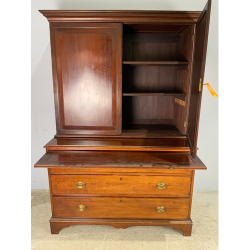 655 - MAHOGANY CHEST OF  3 GRADUATED LONG DRAWERS WITH A BRUSHING SLIDE. WITH CUPBPARD ABOVE  WITH SHELVES... 