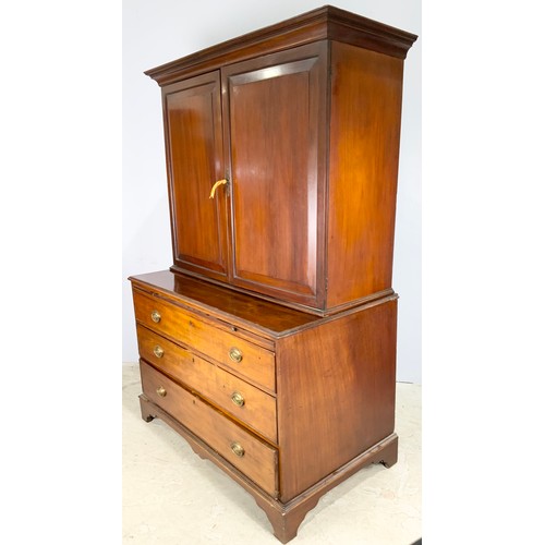 655 - MAHOGANY CHEST OF  3 GRADUATED LONG DRAWERS WITH A BRUSHING SLIDE. WITH CUPBPARD ABOVE  WITH SHELVES... 