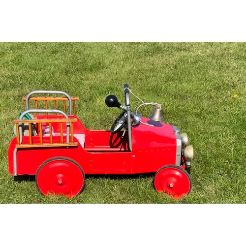 58 - A CHILD'S PEDAL CAR FIRE ENGINE, APPROX 90 CM LONG