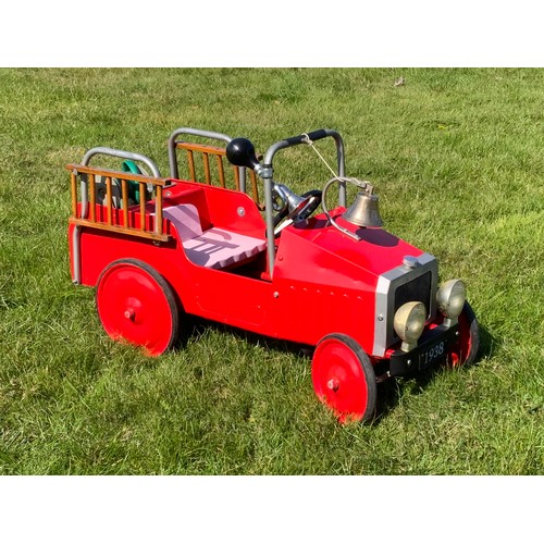 58 - A CHILD'S PEDAL CAR FIRE ENGINE, APPROX 90 CM LONG