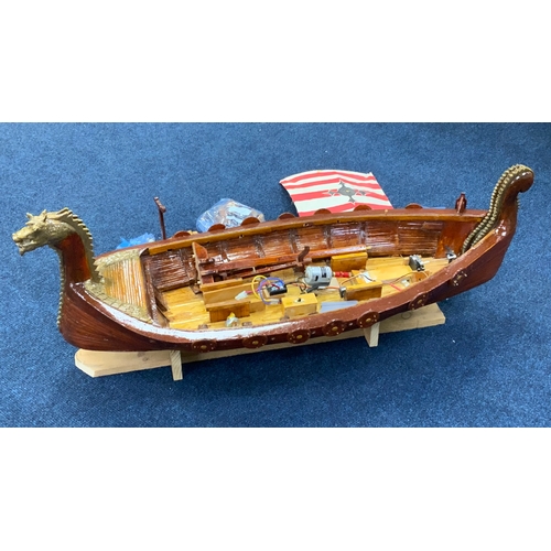 84 - RADIO CONTROLLED MODEL OF A VIKING LONG BOAT, IN NEED OF SOME FINISHING OR REPAIR, WAS COMPLETE AND ... 