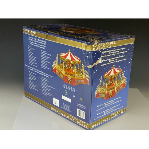 49 - BOXED GOLD LABEL COLLECTION, WORLDS FAIR BOARDWALK CAROUSEL. BOX HAS LABEL ADVISING ”NEW POSSIBLE FA... 