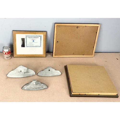 62 - WALL HANGINGS INC 3 CAST UFO , REPLICA MEDALS , CLAY PIPES AND A PAPILLON FILM SLIDE