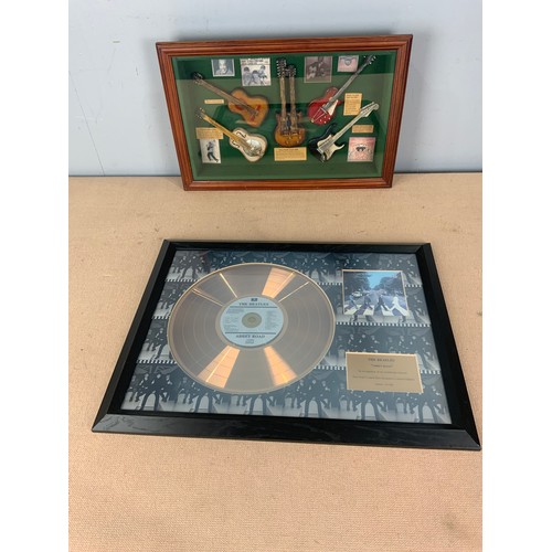 63 - 2 FRAMED WALL HANGINGS INC LIMITED EDITION OF 1500 BEATLES ABBEY ROAD DISC  & VARIOUS MINIATURE WOOD... 