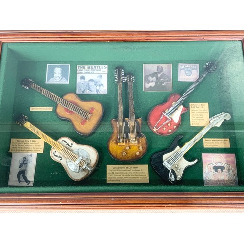 63 - 2 FRAMED WALL HANGINGS INC LIMITED EDITION OF 1500 BEATLES ABBEY ROAD DISC  & VARIOUS MINIATURE WOOD... 