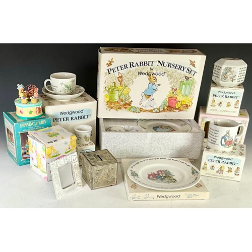 194 - A COLLECTION OF WEDGWOOD PETER RABBIT WARES INCLUDING MUG, PLATE, CUP AND SAUCER PLUS A MINI ACTION ... 