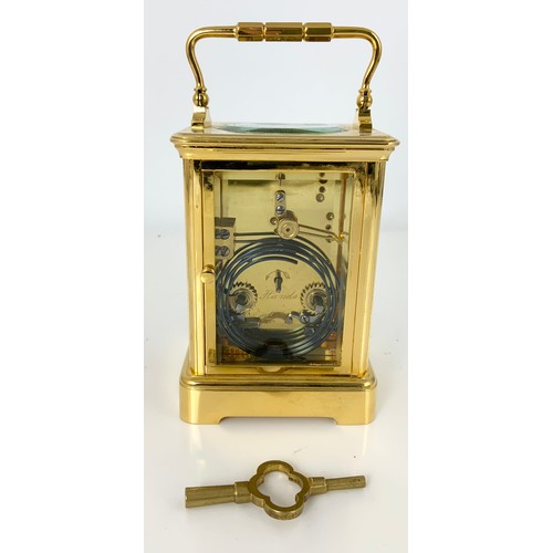 299 - GOLDSMITHS COMPANY, LONDON FOUR GLASS CARRIAGE CLOCK WITH KEY 13.5cm TALL NOT INCLUDING HANDLE