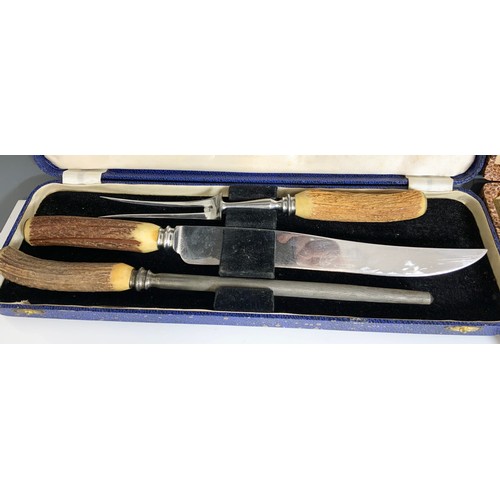 326 - CASED CARVING SET WITH ANTLER HANDLES WITH SILVER PLATED WEAR INC HELMET SALT, TROPHY SERVIETTE RING... 