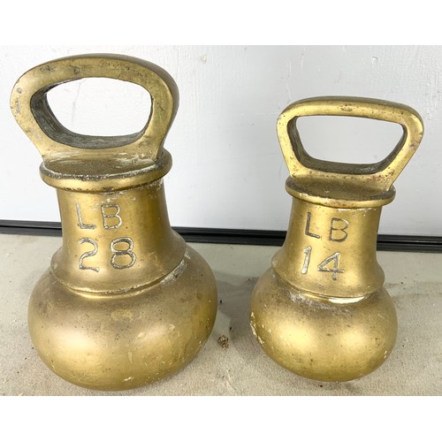 357 - 28LB AND 14LB BELL WEIGHTS TOGETHER WITH ONE OTHER 14LB WEIGHT