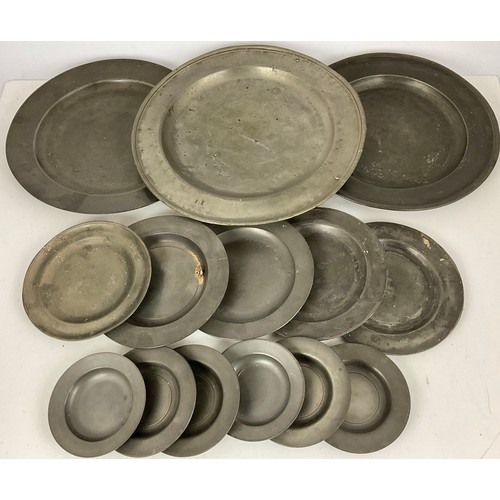 336 - PEWTER CHARGERS AND PLATES, largest approx. 42cm dia. G.Low maker