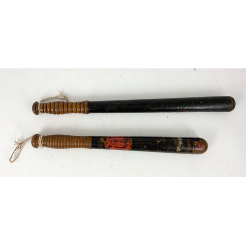 406 - TWO VINTAGE PAINTED TRUNCHEONS ONE STAMPED PARKER HOLBORN THE OTHER FIELD HOLBOURN WITH P325 CRWS FO... 