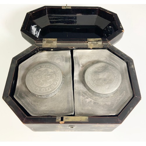 395 - BLACK LACQUERED CHINOISERIE TEA CADDY, OCTAGONAL FORM, WITH FITTED INTERIOR