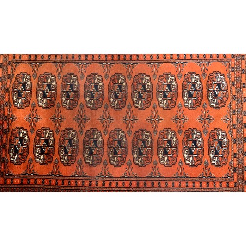 745 - PAKISTAN BOKHARA ORANGE GROUND RUG 99cm x 63cm