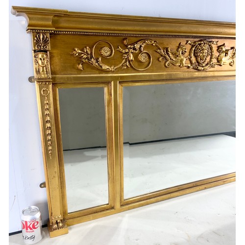 71 - EGYPTIAN REVIVAL GILT FRAMED OVER MANTLE MIRROR WITH 3 BEVELLED PLATES 133cm x 74cm