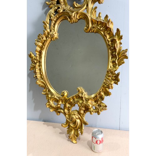 63 - ORNATE GILT FRAMED MIRROR 114cm x 62cm