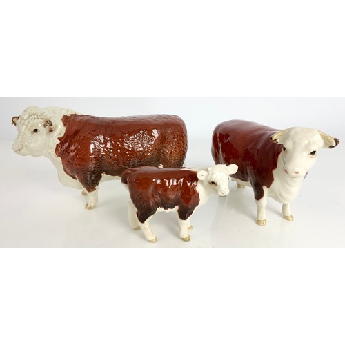 100 - BESWICK HEREFORD CATTLE. A BULL , COW AND CALF MODELS