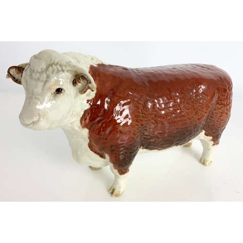 100 - BESWICK HEREFORD CATTLE. A BULL , COW AND CALF MODELS