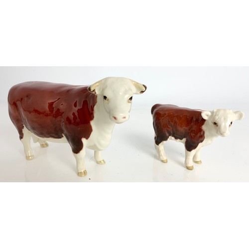 100 - BESWICK HEREFORD CATTLE. A BULL , COW AND CALF MODELS