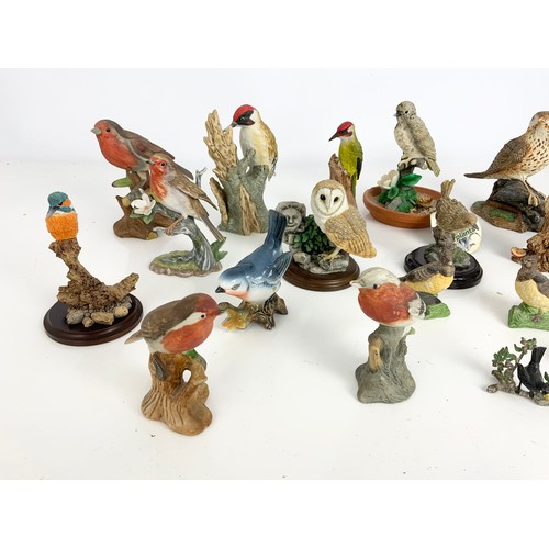 122 - COLLECTION OF DECORATIVE BIRD MODELS INC CERAMIC , RESIN & METAL MODELS