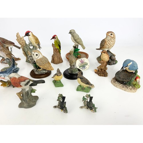 122 - COLLECTION OF DECORATIVE BIRD MODELS INC CERAMIC , RESIN & METAL MODELS