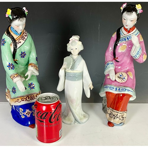 114 - THREE PORCELAIN GEISHA FIGURINES