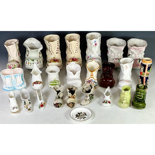 141 - COLLECTION OF CERAMIC AND PORCELAIN DECORATED BOOT VASES