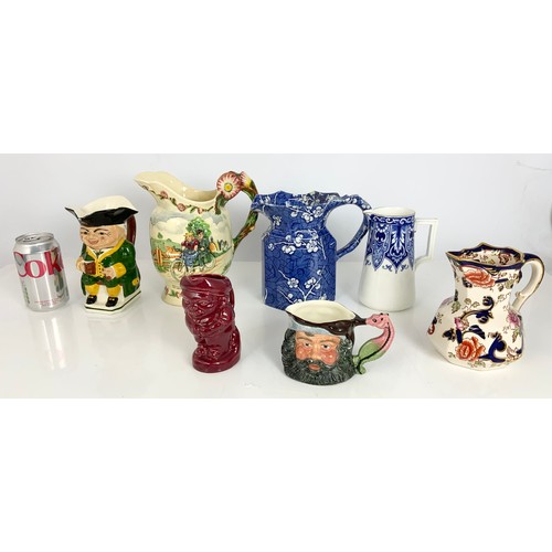 209 - A COLLECTION OF JUGS INCLUDING CHURCHILL, WEDGWOOD  GRAPE GREEN GLAZE JUG, MASONS BLUE AND WHITE, WA... 