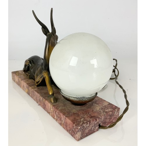 260 - ART DECO STYLE LAMP WITH GILT METAL IMPALA & GLOBULAR WHITE BULB ON RED MARBLE BASE WIDTH 30cm