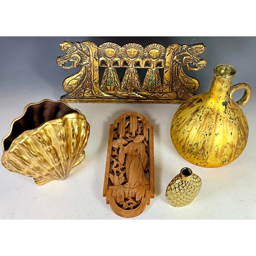 344 - A BALINESE DRAGON BOAT WOOD PANEL AND A CERAMIC GOLD COLOURED CLAMSHELL VASE, A GILTED GLASS EWER, A... 