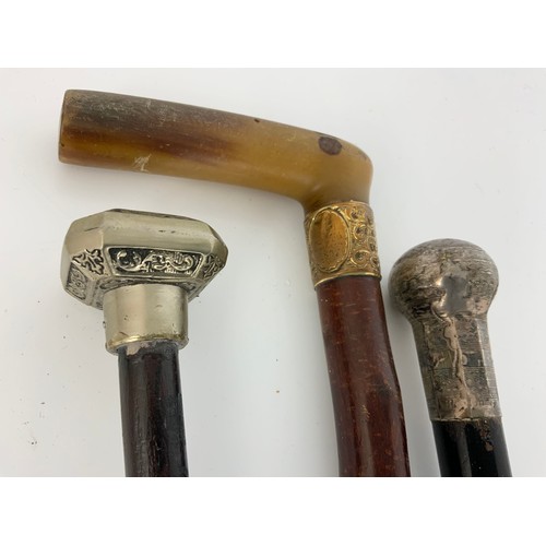 360 - WHITE METAL TOPPED EBONISED CANE , WALKING STICK WITH HORN HANDLE & YELLOW METAL BAND DATED 1897 & A... 