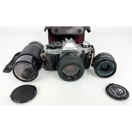 422 - CANON AE-1 SLR CAMERA WITH LENSES