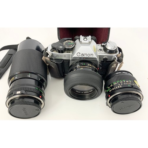 422 - CANON AE-1 SLR CAMERA WITH LENSES