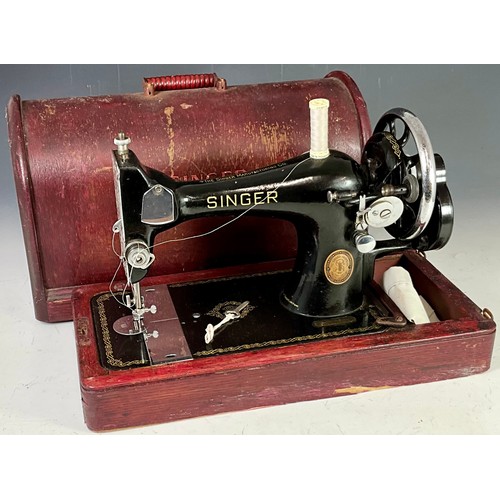 481 - TWO CASED SINGER SEWING MACHINES, ONE WITH KEY. SERIAL NUMBERS 13222312 & EH809169