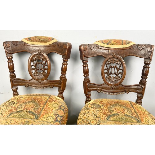 669 - TWO UNUSUAL TAPESTRY SEAT CARVED WOODEN CHAIRS WITH CLAW FEET GOOD QUALITY