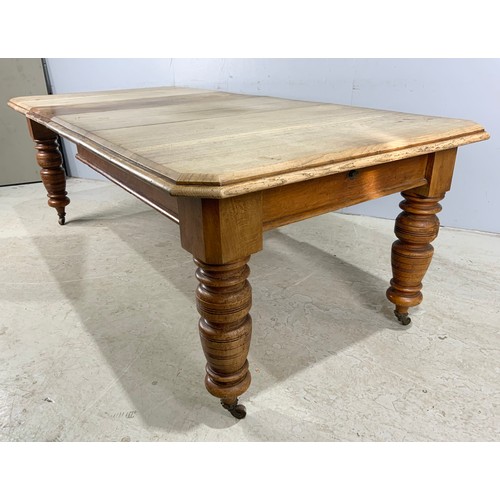 540 - OAK WIND OUT DINING TABLE WITH TWO LEAVES ON TURNED LEGS 223cm x  106cm EXTENDED