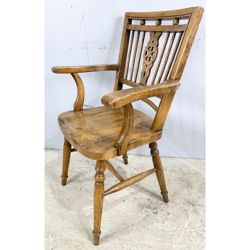 652 - OAK WHEEL BACK ARM CHAIR