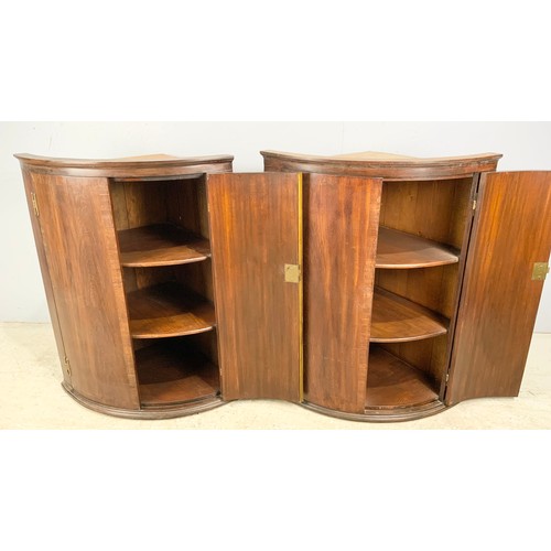 547 - PAIR OF BOW FRONT MAHOGANY HANGING CORNER CUPBOARDS 94cm TALL